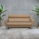 CODA beige leather sofa with modern design and metal legs in a minimalist living room setting